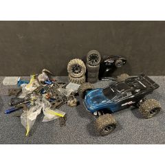 Tweedehands Traxxas Rustler 4x4 VXL Blauw met extra wielen & reserve delen